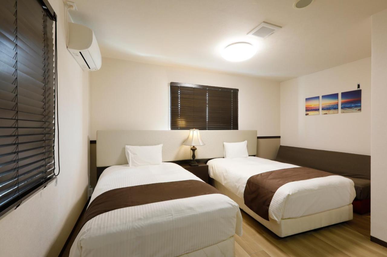 Phoenix Park Hotel Nago Extérieur photo