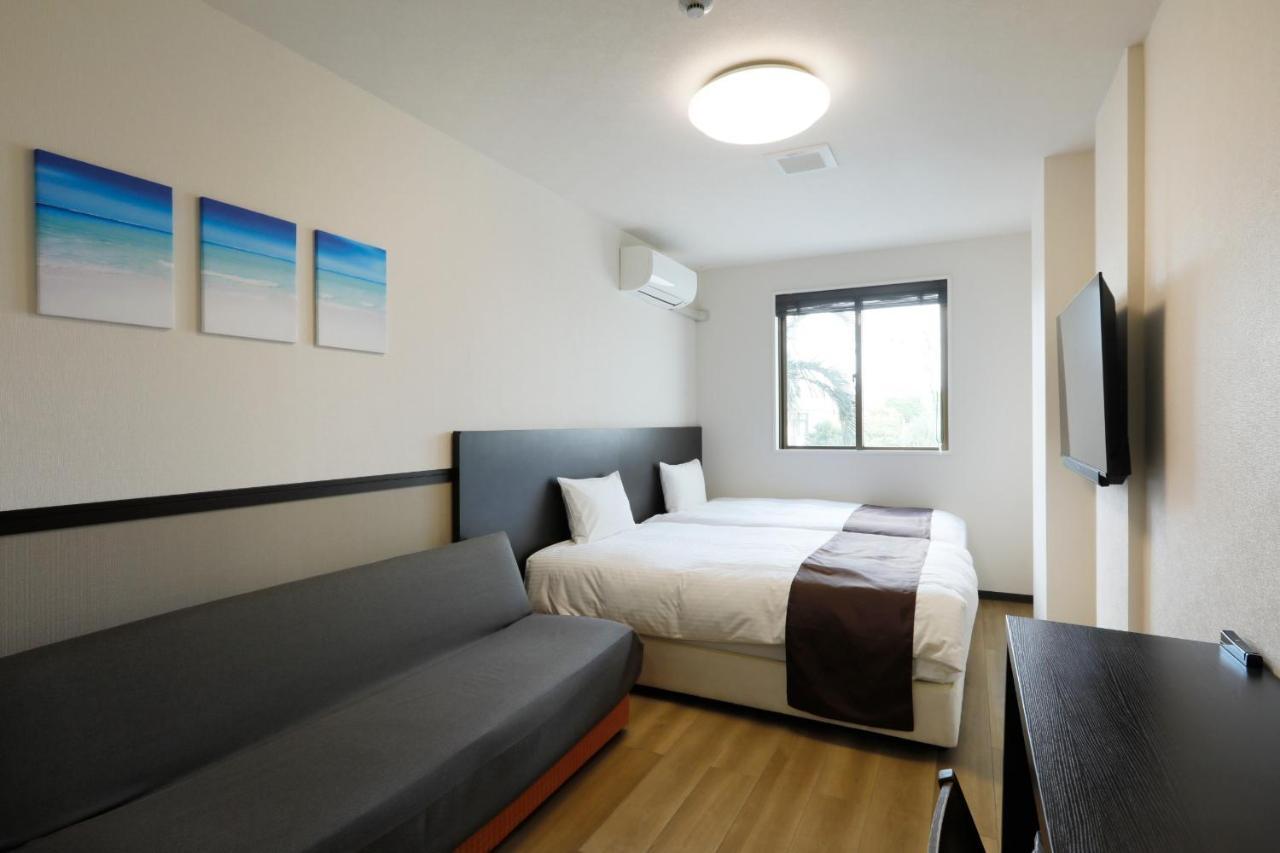 Phoenix Park Hotel Nago Extérieur photo
