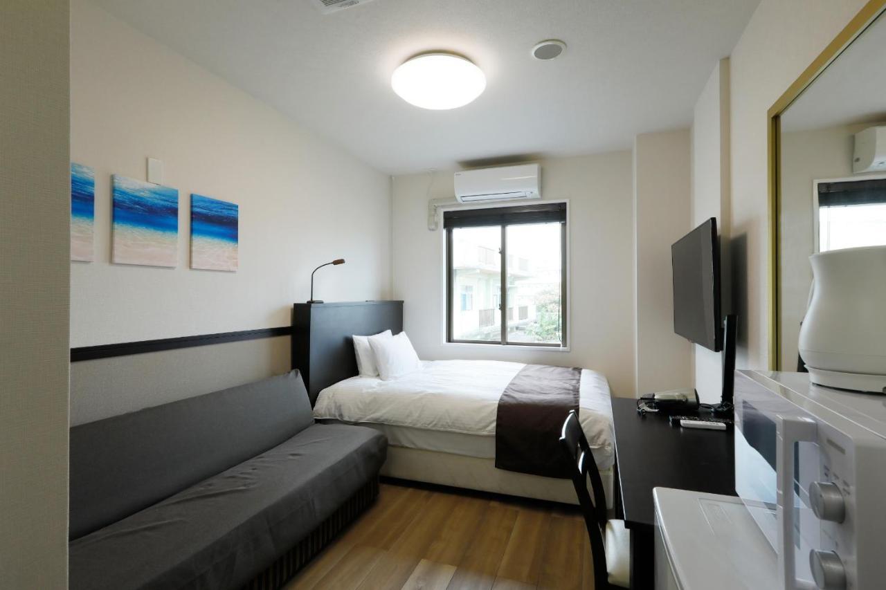 Phoenix Park Hotel Nago Extérieur photo