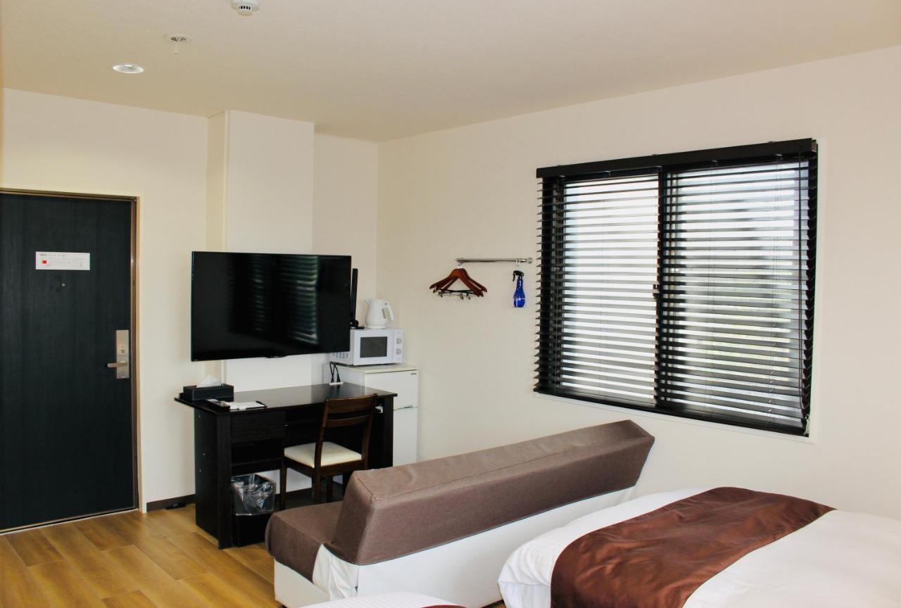 Phoenix Park Hotel Nago Extérieur photo