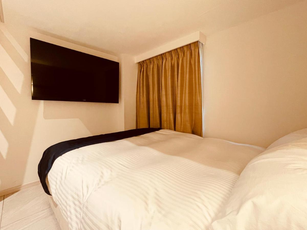 Phoenix Park Hotel Nago Extérieur photo