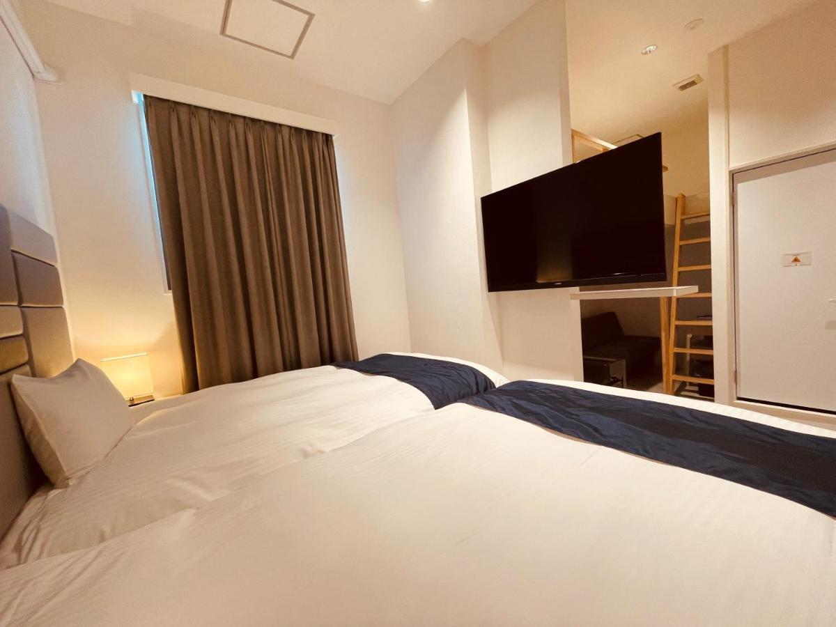 Phoenix Park Hotel Nago Extérieur photo
