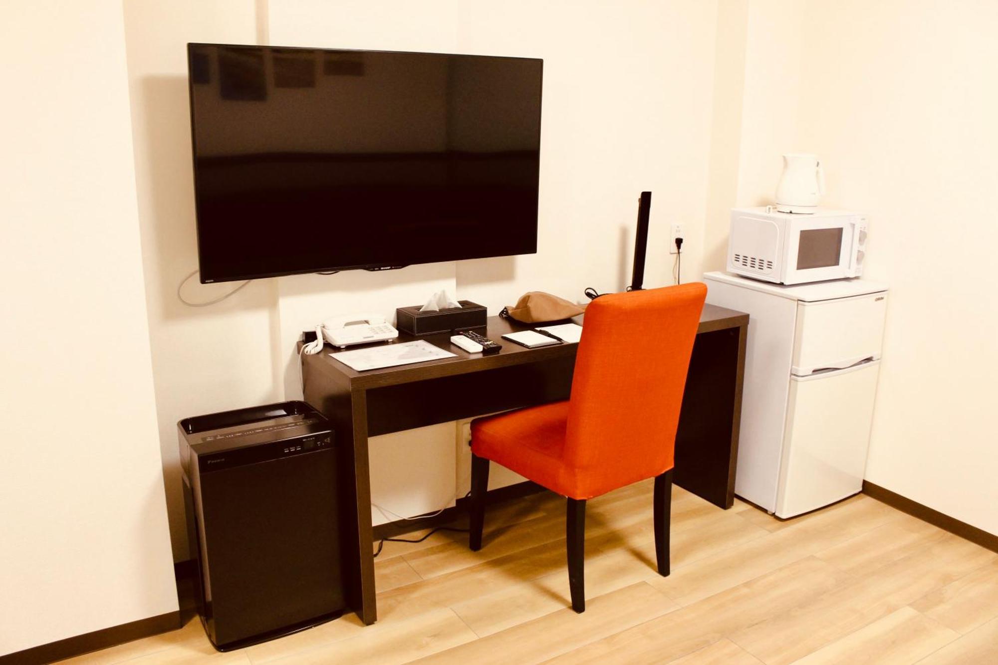 Phoenix Park Hotel Nago Chambre photo