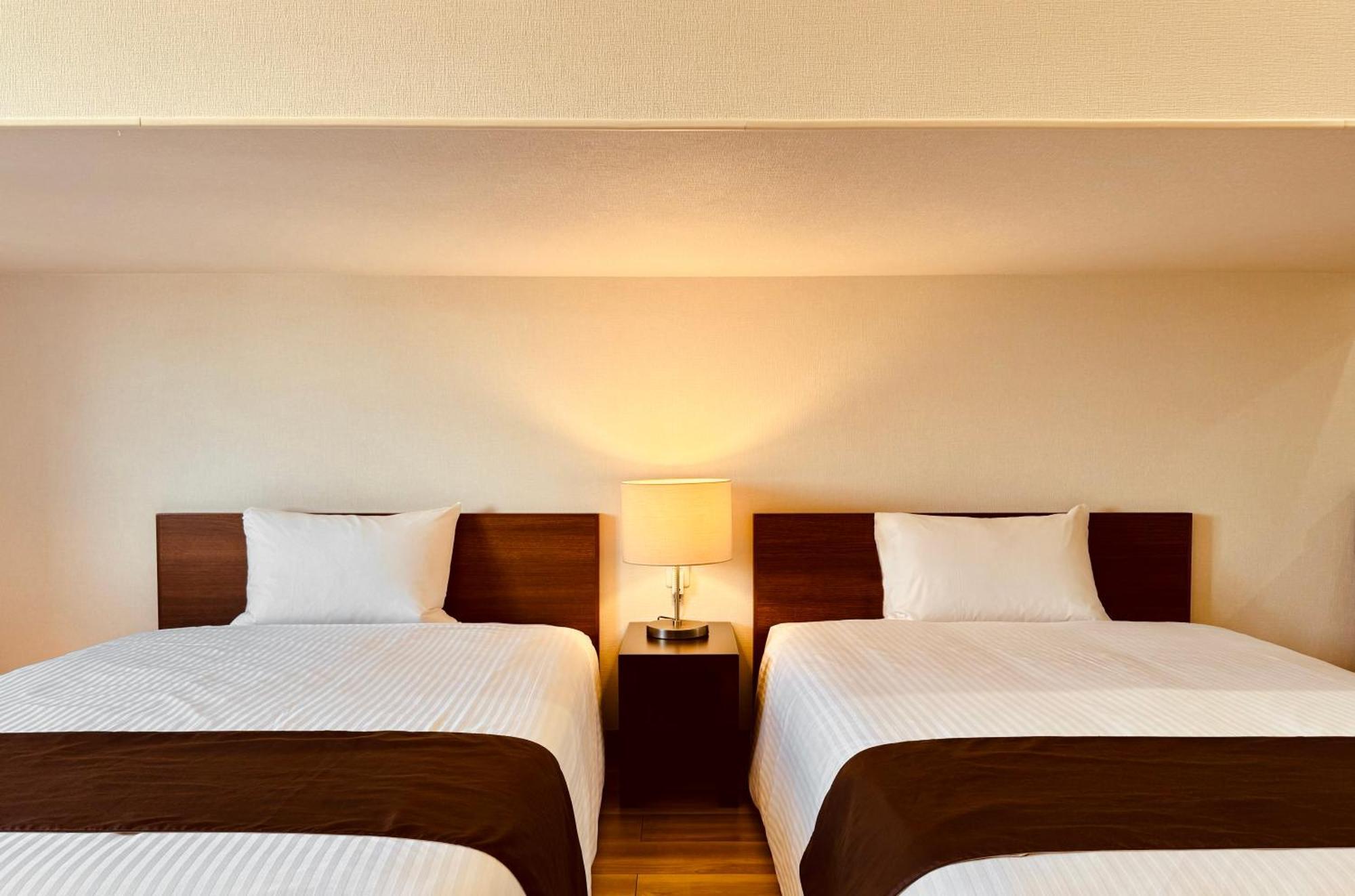Phoenix Park Hotel Nago Extérieur photo
